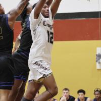 Damond Matthews gets fouled on the arm en route to a slam dunk attempt