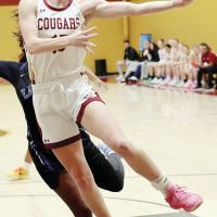 Katelyn Harviston shoots a fastbreak layup against Eastern