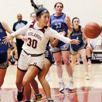 Hannah Harris reaches out to try and grab a rebound