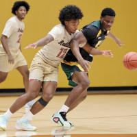 Damond Matthews battles for a loose ball