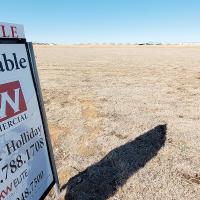 The land behind this sign is being purchased by Redlands