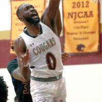 Kevin Buckley floats a shot around the rim