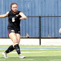 Carlie Golden follows through on a kick