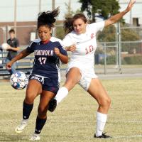 RCC soccer_ Tharp kicks ball