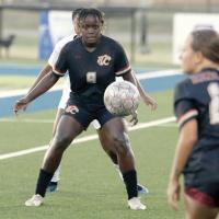 Ashanti Lewis positions herself in front of a throw-in