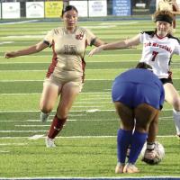 Gaby Figueroa has a shot stopped by a goalie