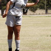 Riley Robertson tries to use her head to redirect a goal kick