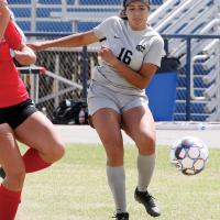 Ashley Monterrosa watches her shot sail toward the goal