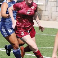 Billie Orth works the ball past a defender