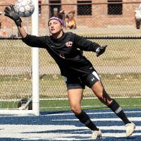 Kalie Winstead reaches out to block a shot