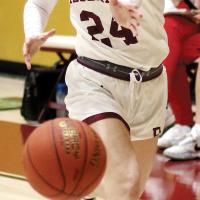 Allie Harris makes a pass into the paint