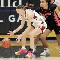 Karlee Harviston tries to grab a loose ball