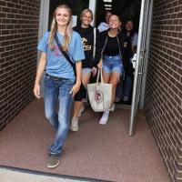 McKenzie Simon leads new students on a tour of the campus during fall orientation
