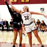 Kristen Readel tries to grab an offensive rebound