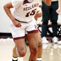 Nyah Banks dribbles up the court after making a steal