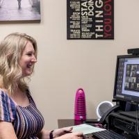 Elise McCauley Rowe speaks with her students over Zoom