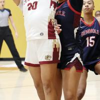 Alaura Pruitt (20) shoots a jumper in the paint against Pauline Black-Harmon