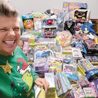 Victoria Lee shows some of the toys collected for El Reno kids