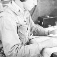 Leslie Roblyer at his station, the navigator’s table in the nose of a B-17
