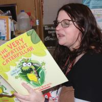 Shelly Hudson records herself reading a book