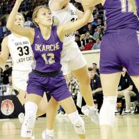 Ruby VanDenDriessche & Emma Stover wrestle for a rebound with a Seiling player
