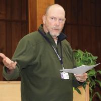 Matt Goucher discusses the state’s report card during the December school board meeting