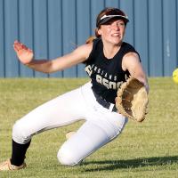 Maddie Moss dives forward as she tries to make a catch