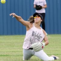 Krystiana Guzman throws toward third base