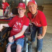 Blu Phillips, right, is pictured with Hunter, one of the nonprofit’s riders
