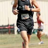 Ethan Brooks runs in the top five at the 2024 Suburban Conference meet at Carl Albert