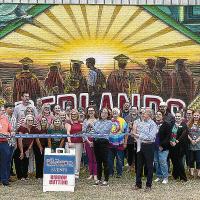 Redlands faculty and staff along with students gathered for a ceremonial ribbon-cutting