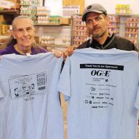 Nikki Pruitt and The Lord’s Harvest volunteer Quentin Arndt show off the National Letter Carriers Association Food Drive T-shirts