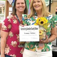 Donna Jung (left) presented Tammy McKee with her award
