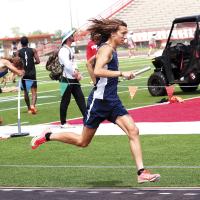 Ethan Brooks runs a relay leg