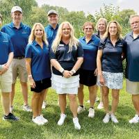 Scott Law, far right, joins with other members of the Oklahoma delegation that traveled to Oshkosh, Wis., representing the state and El Reno