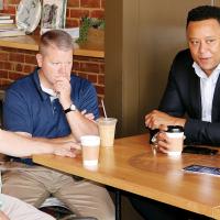 T.W. Shannon visits with Mike Sanders and David Egan
