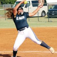 Taylor Acosta eyes the plate as she strides into a fastball