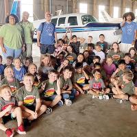 Campers and staff pause for a group photo