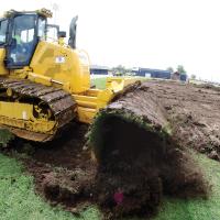 ATG Sports began tearing up the grass field at Memorial Stadium