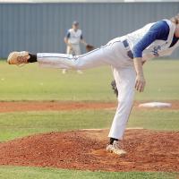 J.D. Riley keeps a close eye on the plate as he follows through on a pitch