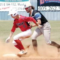 Dalton Stout tags the back of a Southwest Covenant base runner