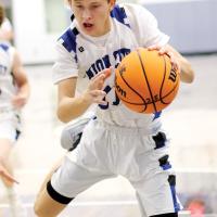 J.D. Riley pulls down a rebound during a game earlier this season