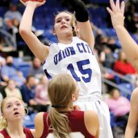 Laila Goad shoots a jumper in traffic