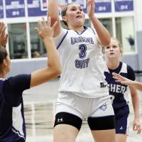 Kamryn Cook shoots a jumper in traffic