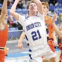 Kaden Cummings leans into a jumper