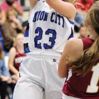 Taytim Woods shoots a layup