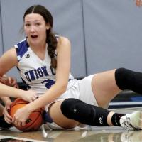 Mackenzie DeLong battles for a loose ball