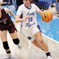 Breanna Goad drives around a defender