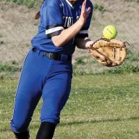 MaKenna DeLong prepares to snag a bouncing ball