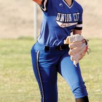 MacKinzie DeLong makes a throw toward first